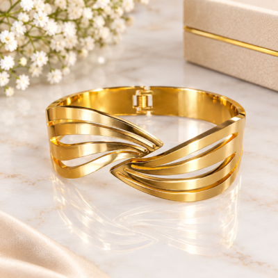 Anti tarnish wave bracelet with layered gold-tone cuff design